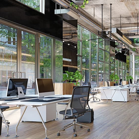 Interior of an office with windows and outside views.